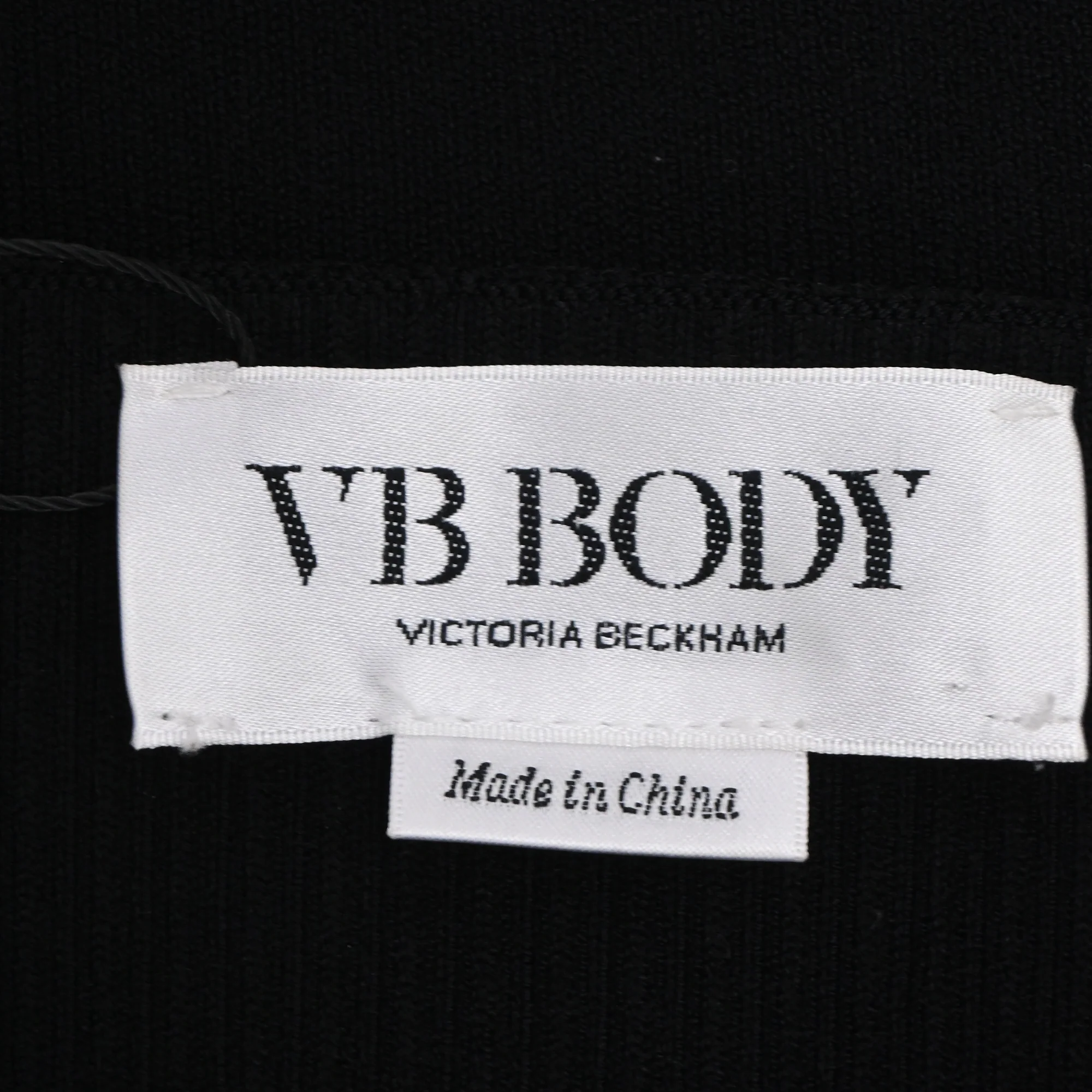 Women's Victoria Beckham Body High-Rise Knit Midi Skirt in Black Viscose - Image 4