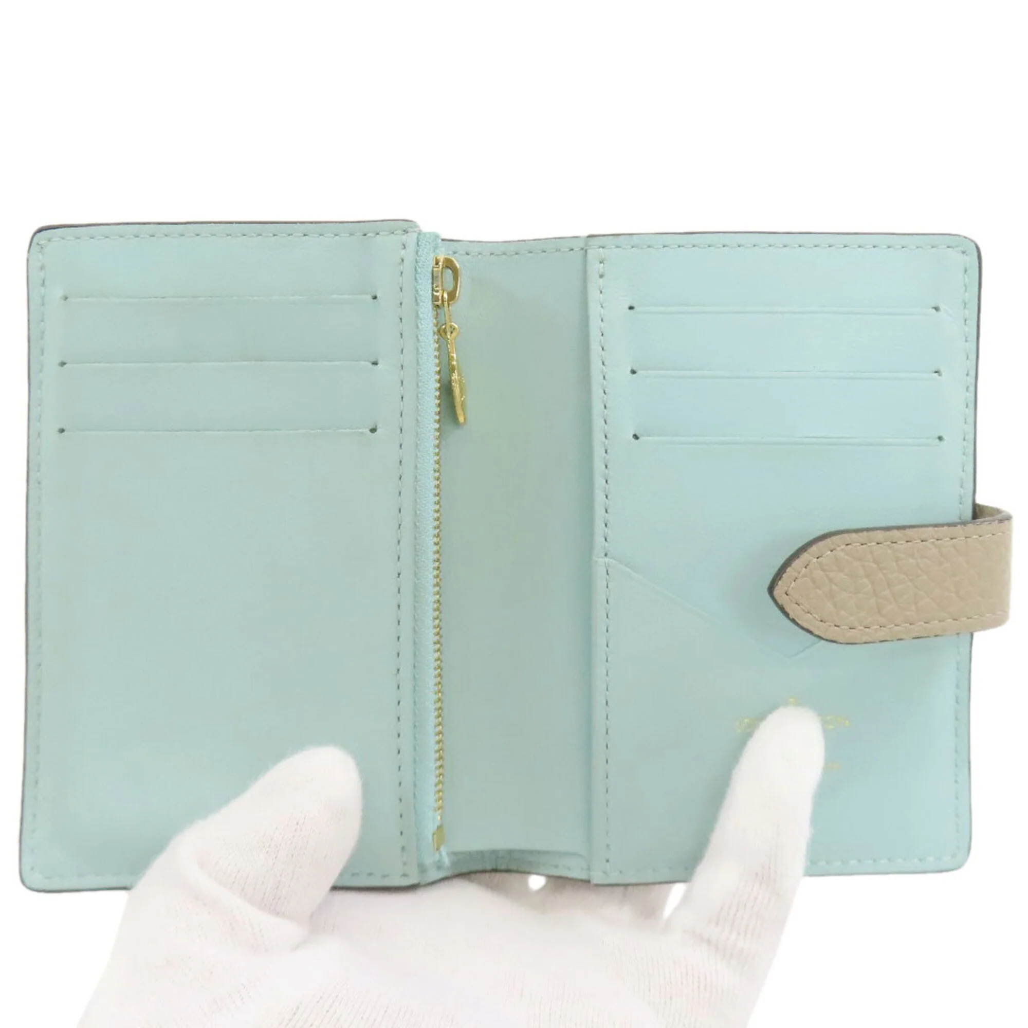 LV Vertical Wallet Taurillion Leather Compact - Image 4